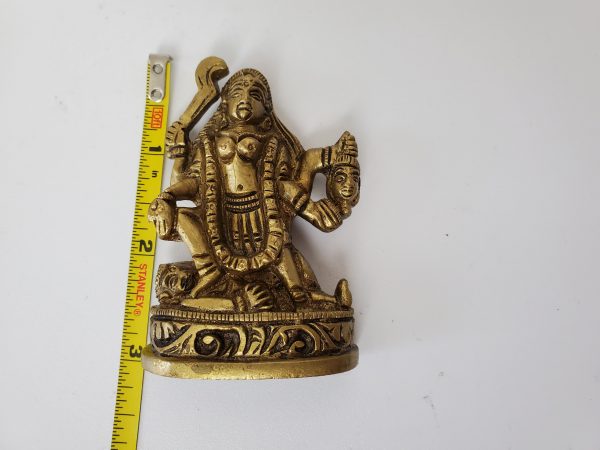 Small Brass Kali holding a head