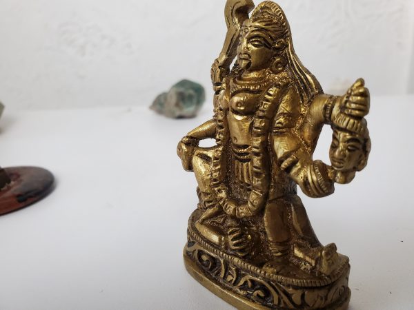 Small Brass Kali holding a head